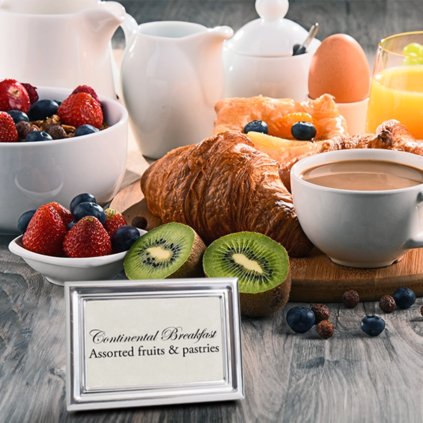 A continental breakfast with a Royal Silver Buffet Frame 