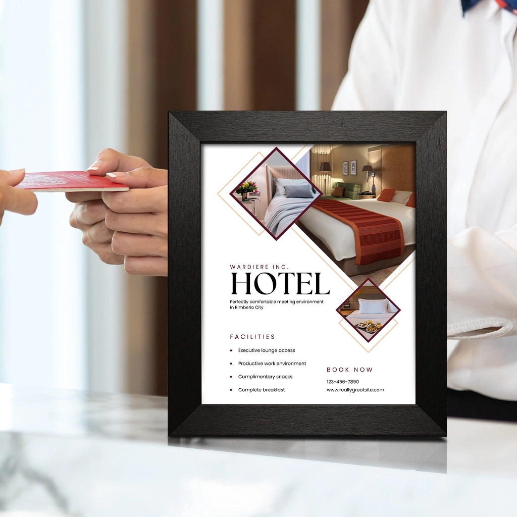 An Aero Black Frame on a Hotel reception desk with an advert inserted