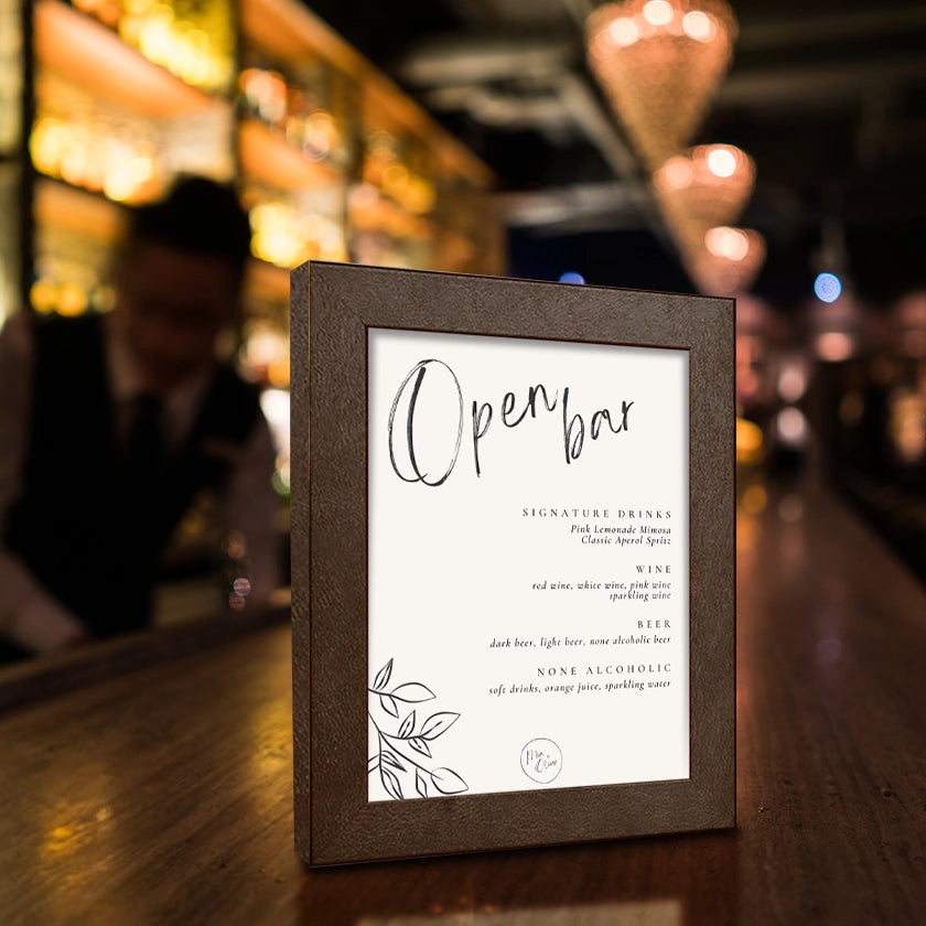 A Buckingham leather frame on a bar with a drink menu insert for an event 